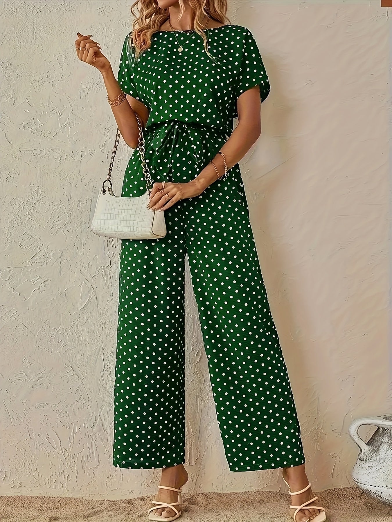 Effortless Polka Dot Jumpsuit for Women with Boat Neck Short Sleeve Tied Waist Wide Leg Style