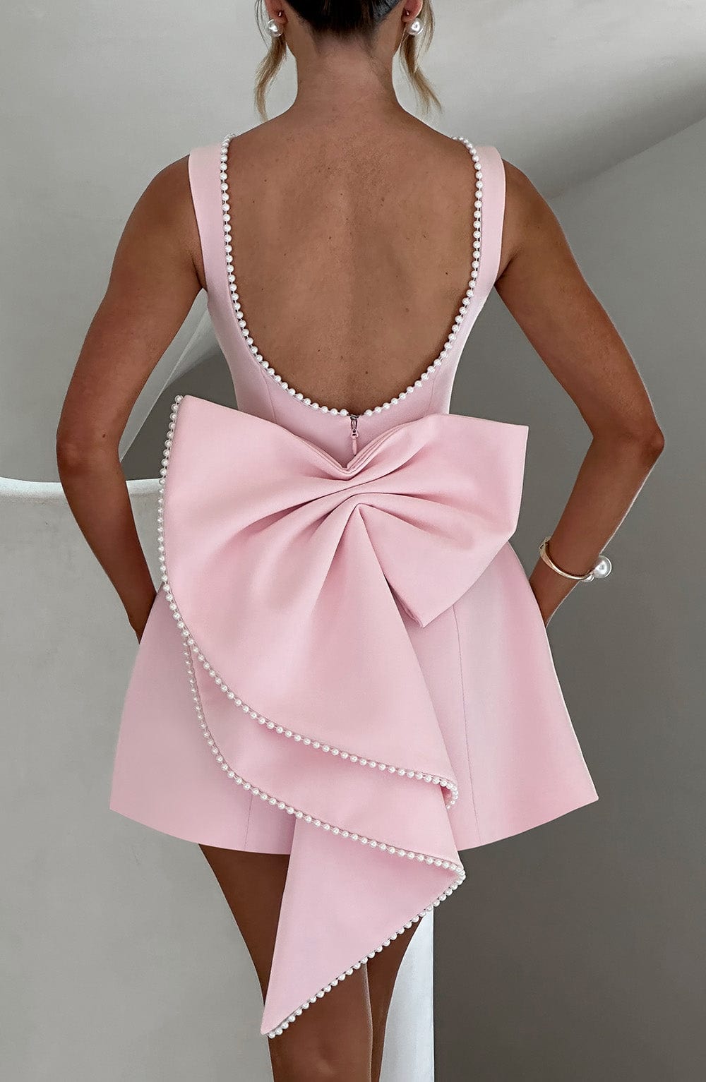 Elegant Pearl Trim Mini Dress for Women with Bateau Neck Sleeveless Bow Back Fit and Flare Cocktail Style