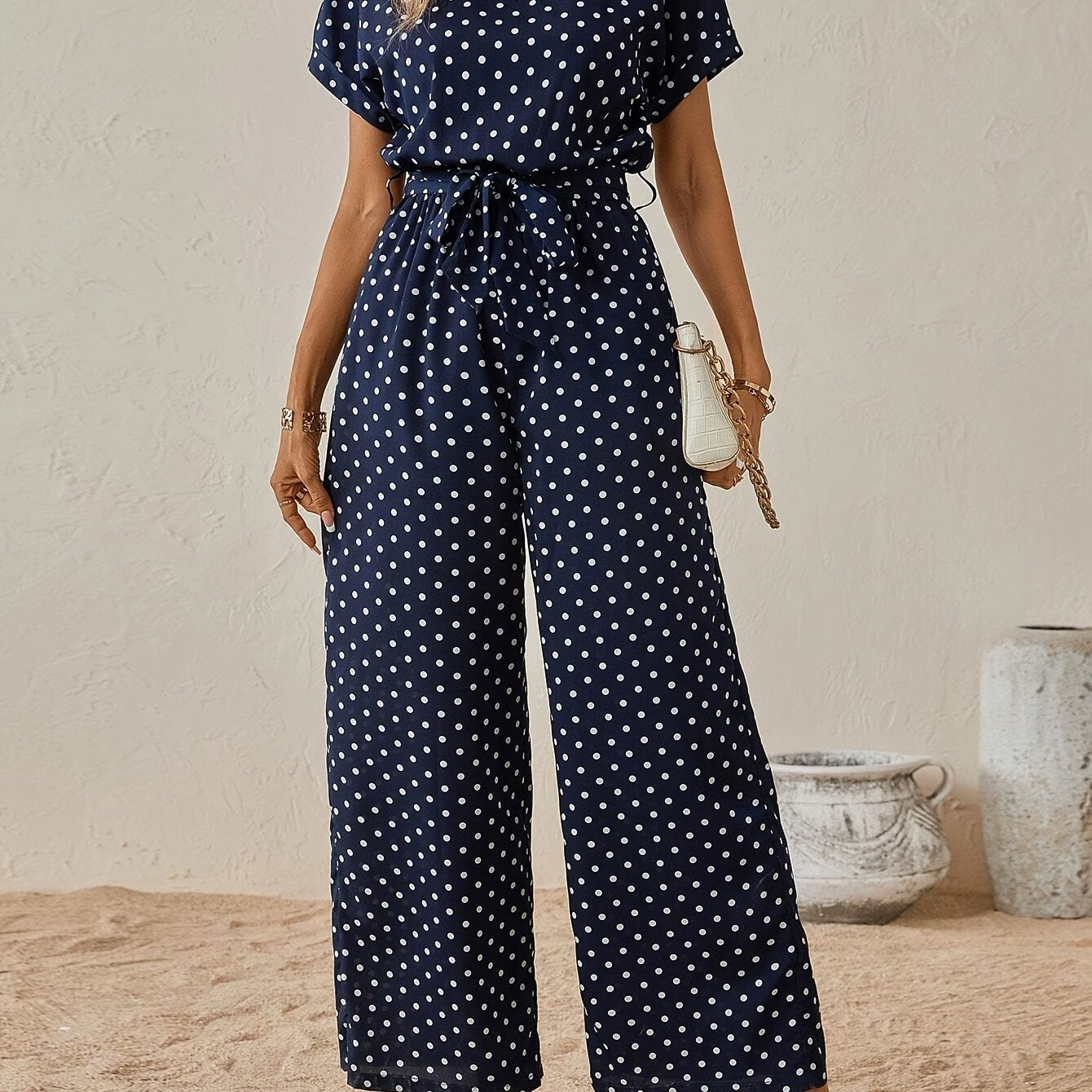 Effortless Polka Dot Jumpsuit for Women with Boat Neck Short Sleeve Tied Waist Wide Leg Style