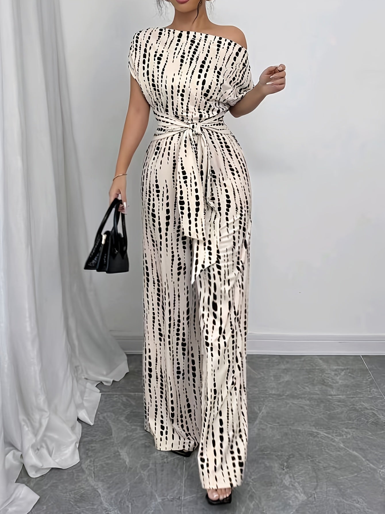 Elegant Apricot Abstract Print Jumpsuit for Women with One Shoulder Short Sleeve Belted Wide Leg Style