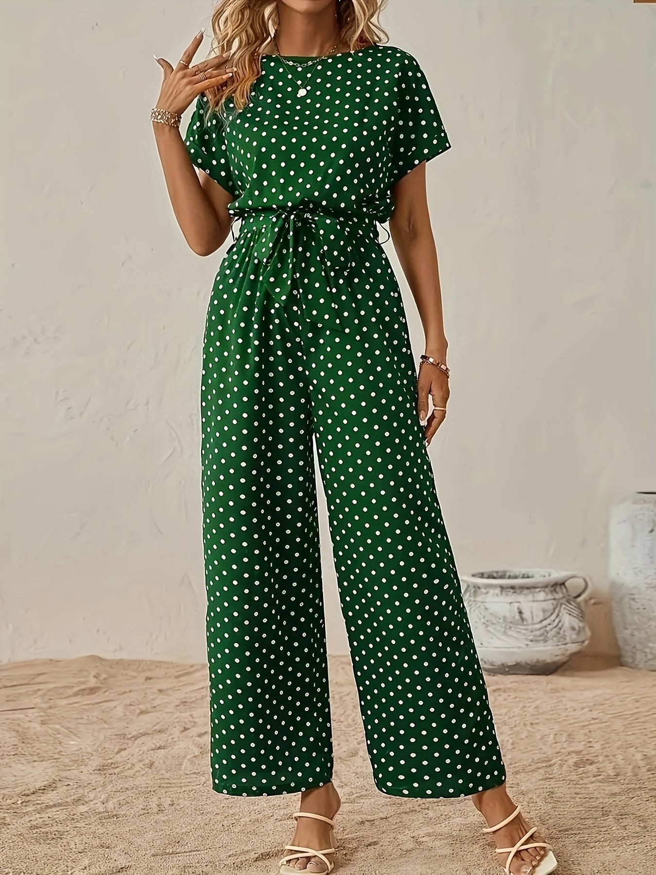 Effortless Polka Dot Jumpsuit for Women with Boat Neck Short Sleeve Tied Waist Wide Leg Style